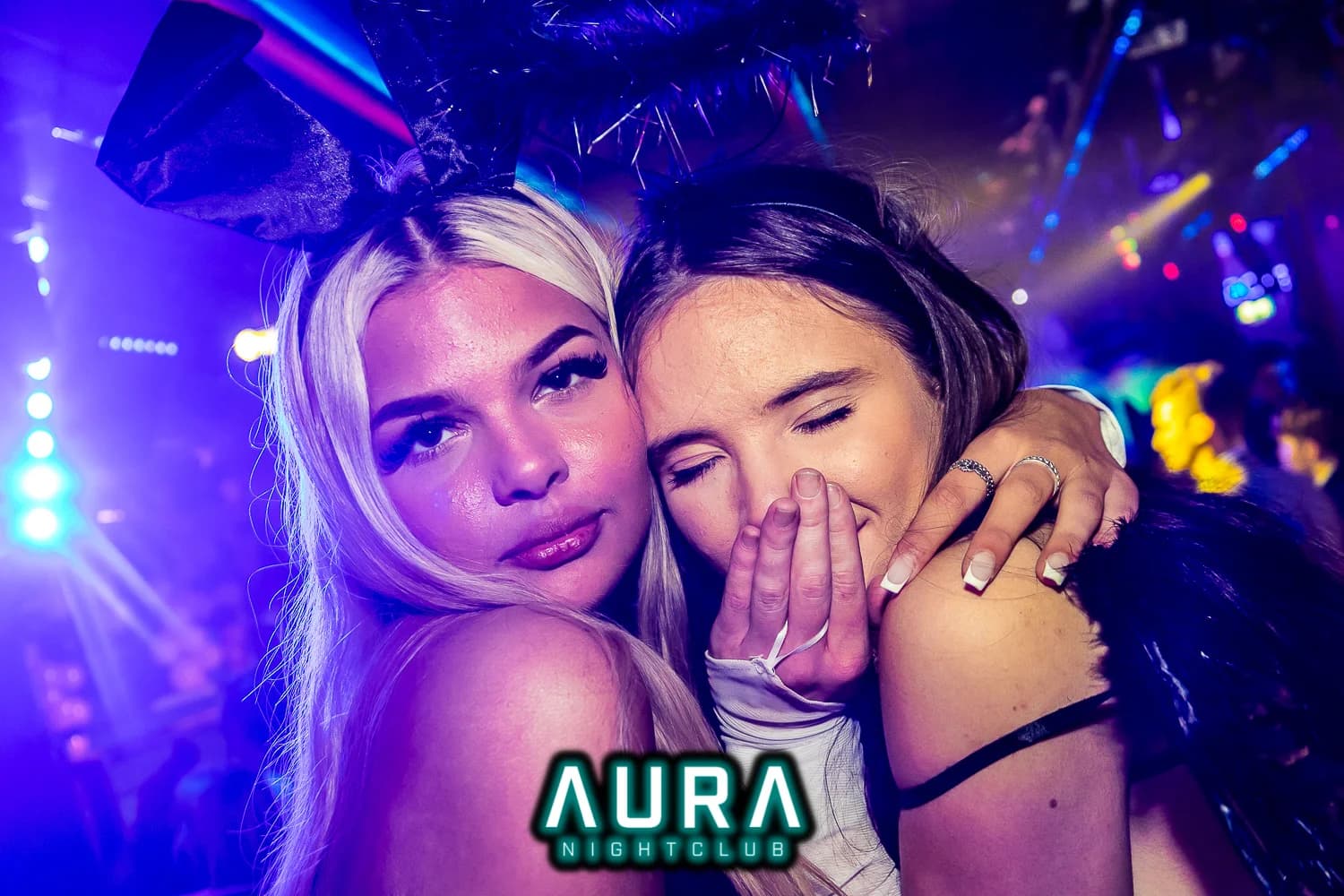 Close-up celebration moment at Aura